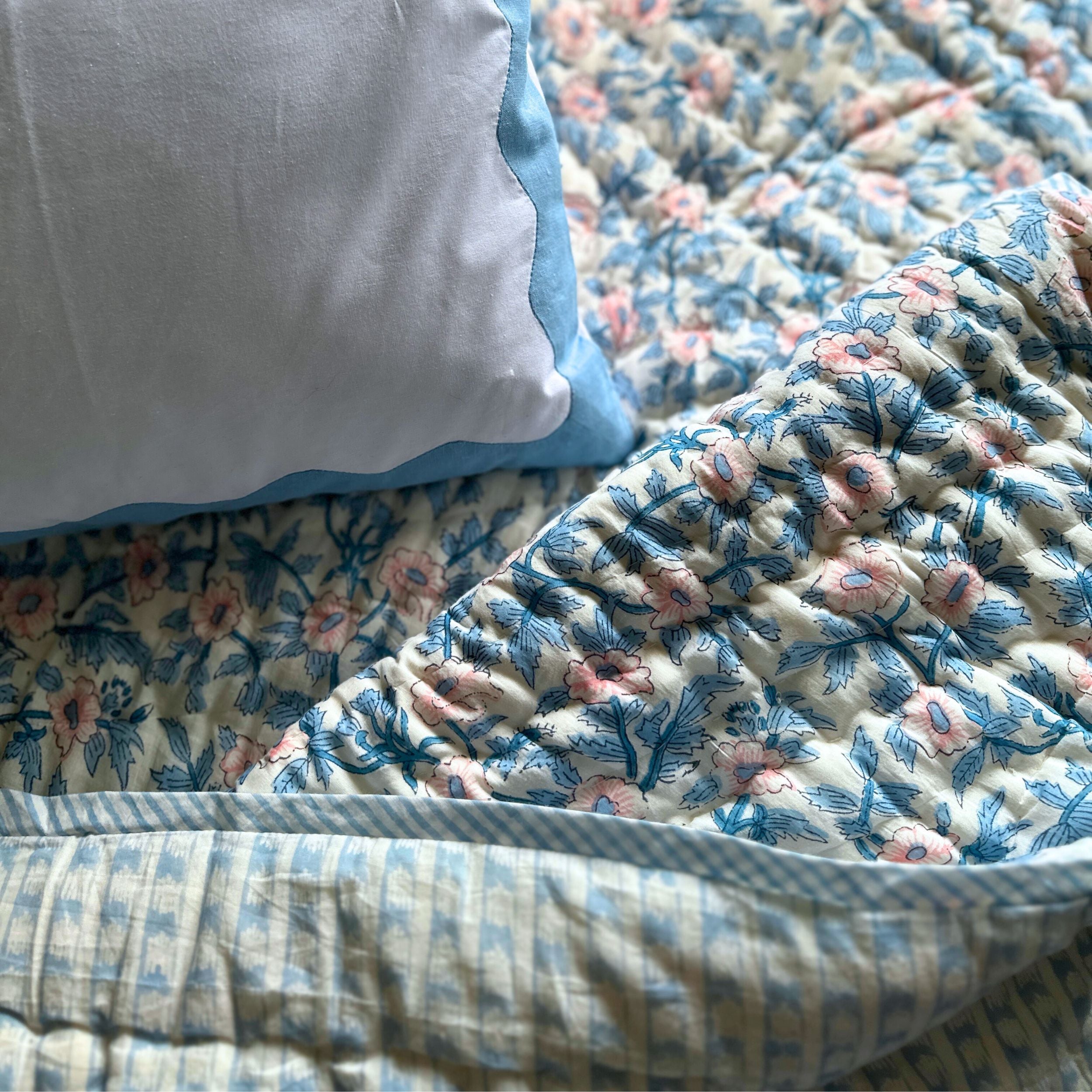 Blue and Pink Floral Quilt