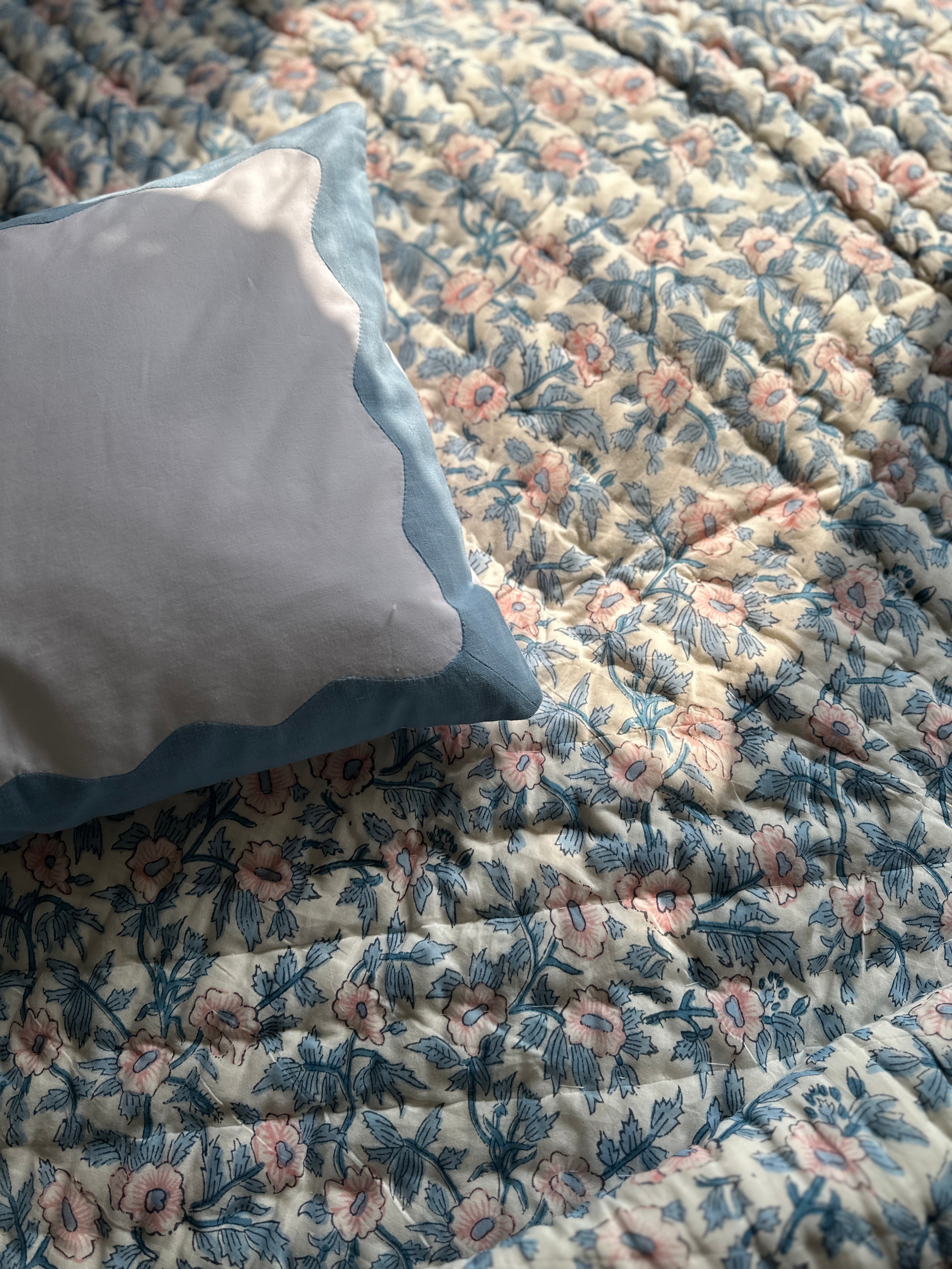 Blue and Pink Floral Quilt