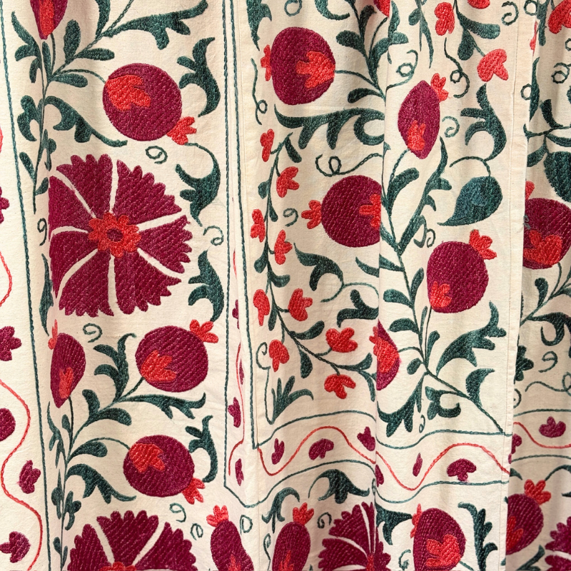 A one off hand embroidered Suzani textile in a beautiful colour palette.