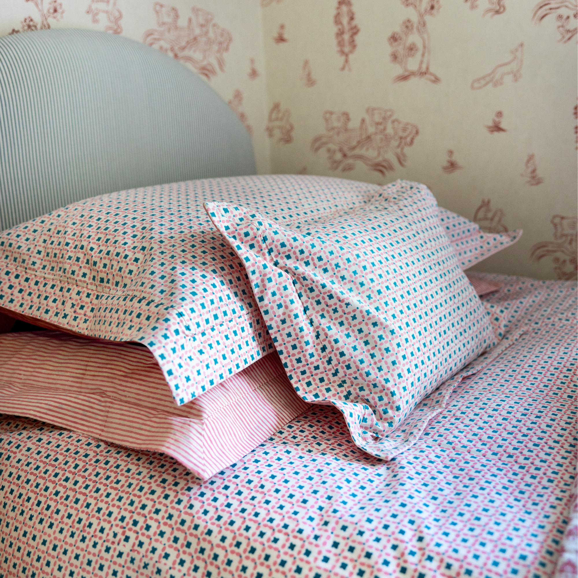 Hand block printed cotton duvet cover in our new Criss Cross design on one side and classic stripes on the reverse.
