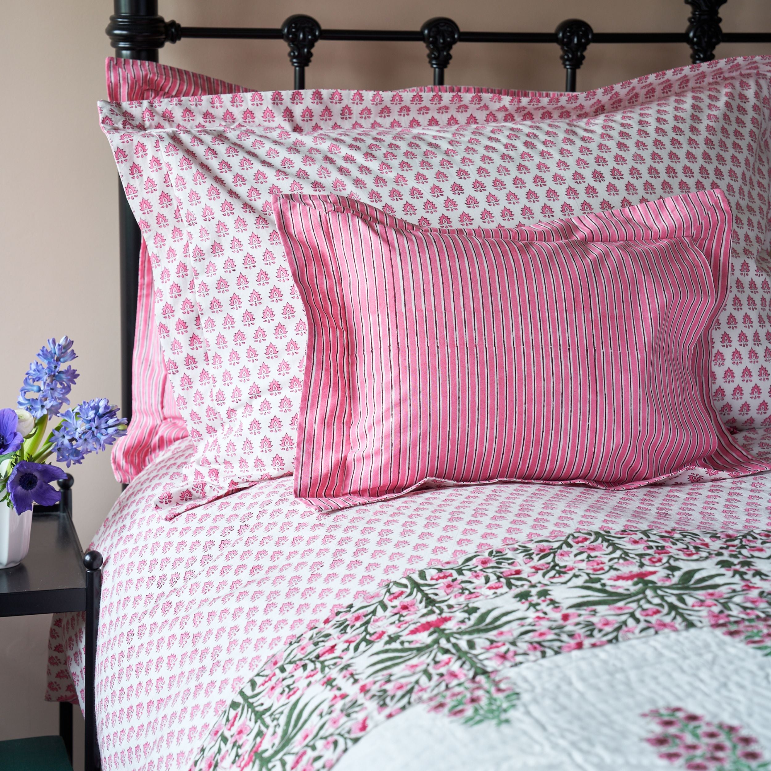 Hand block printed cotton duvet cover in our popular Pomily design on one side and classic stripes on the reverse.