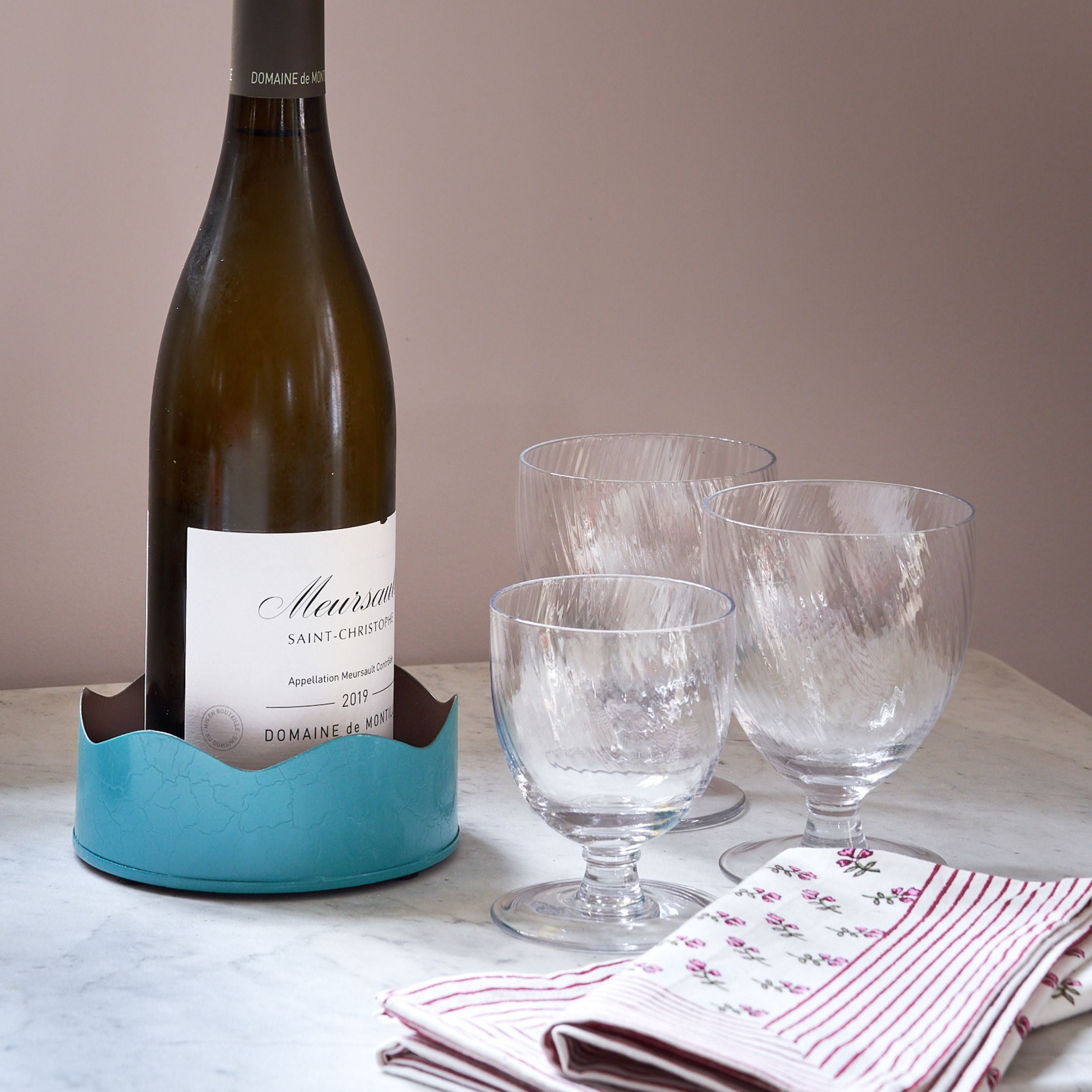 Scalloped blue and brown wine coaster