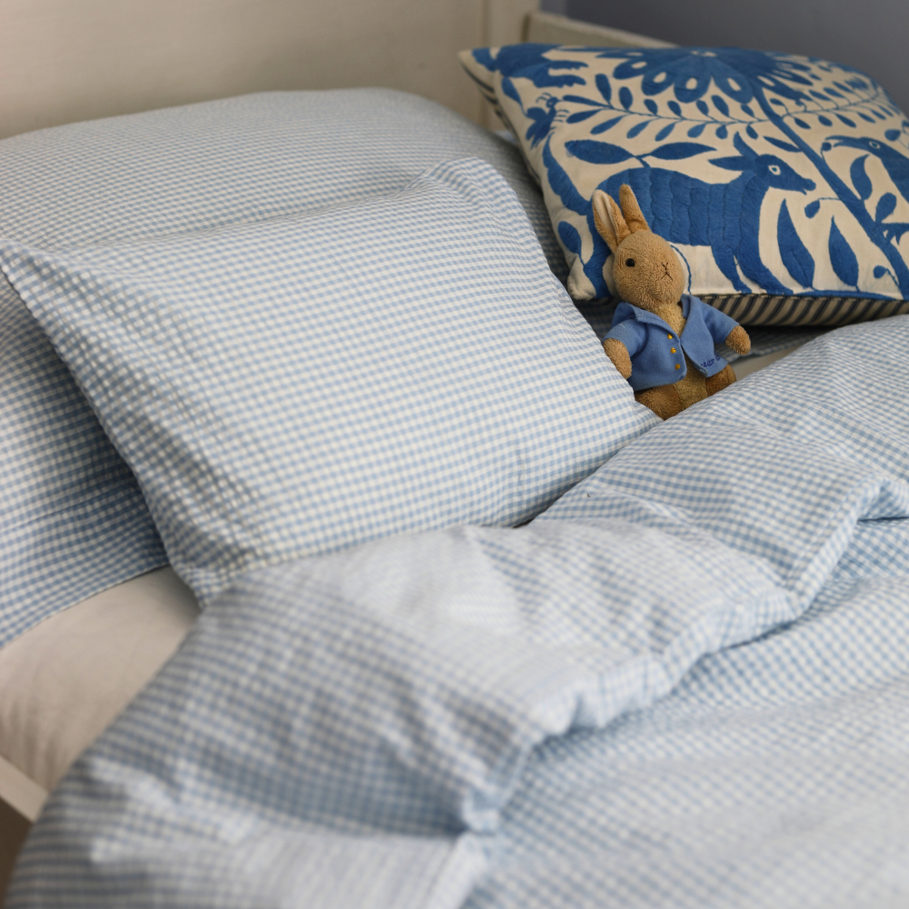 Pale blue cot sales bedding