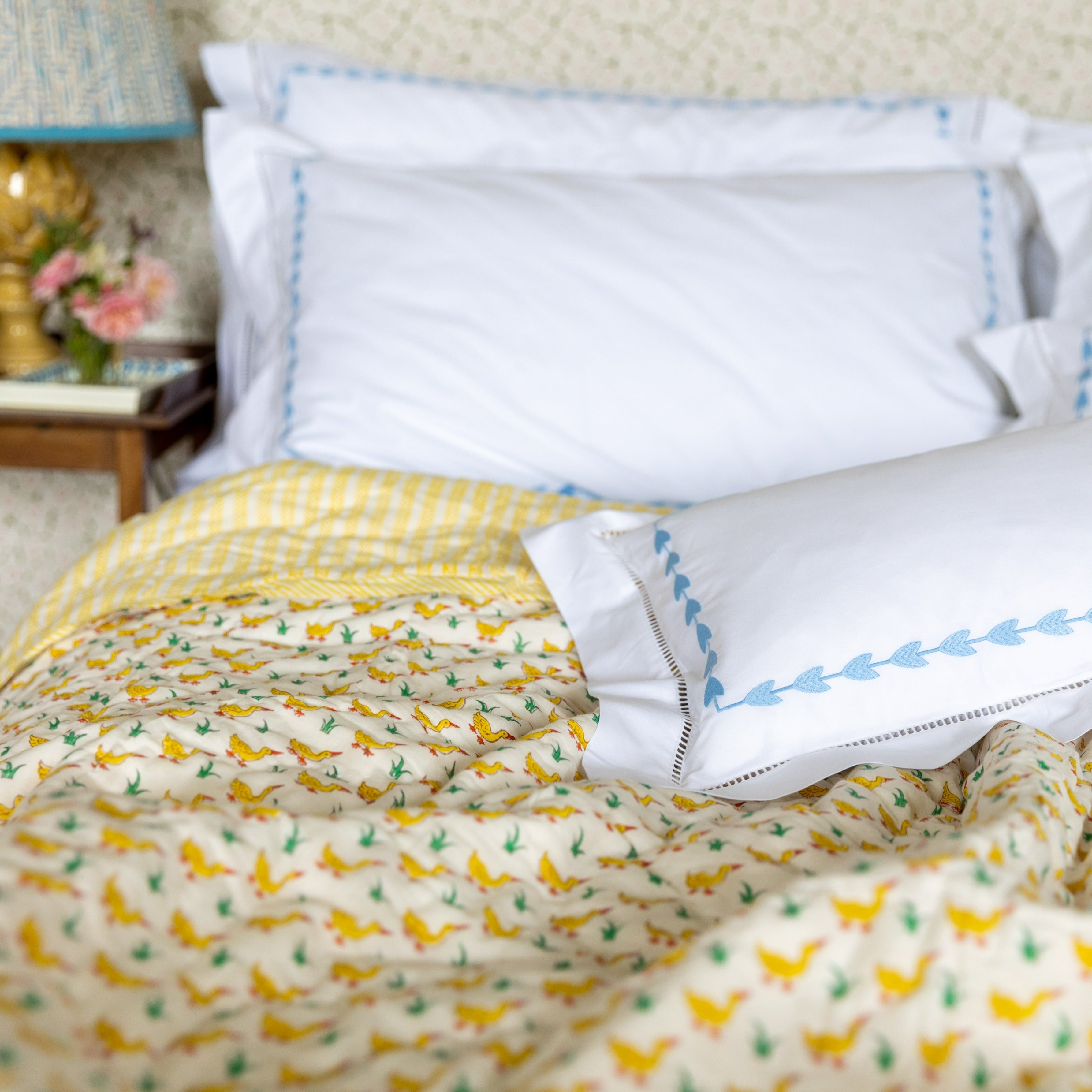 Yellow ducks block printed quilt