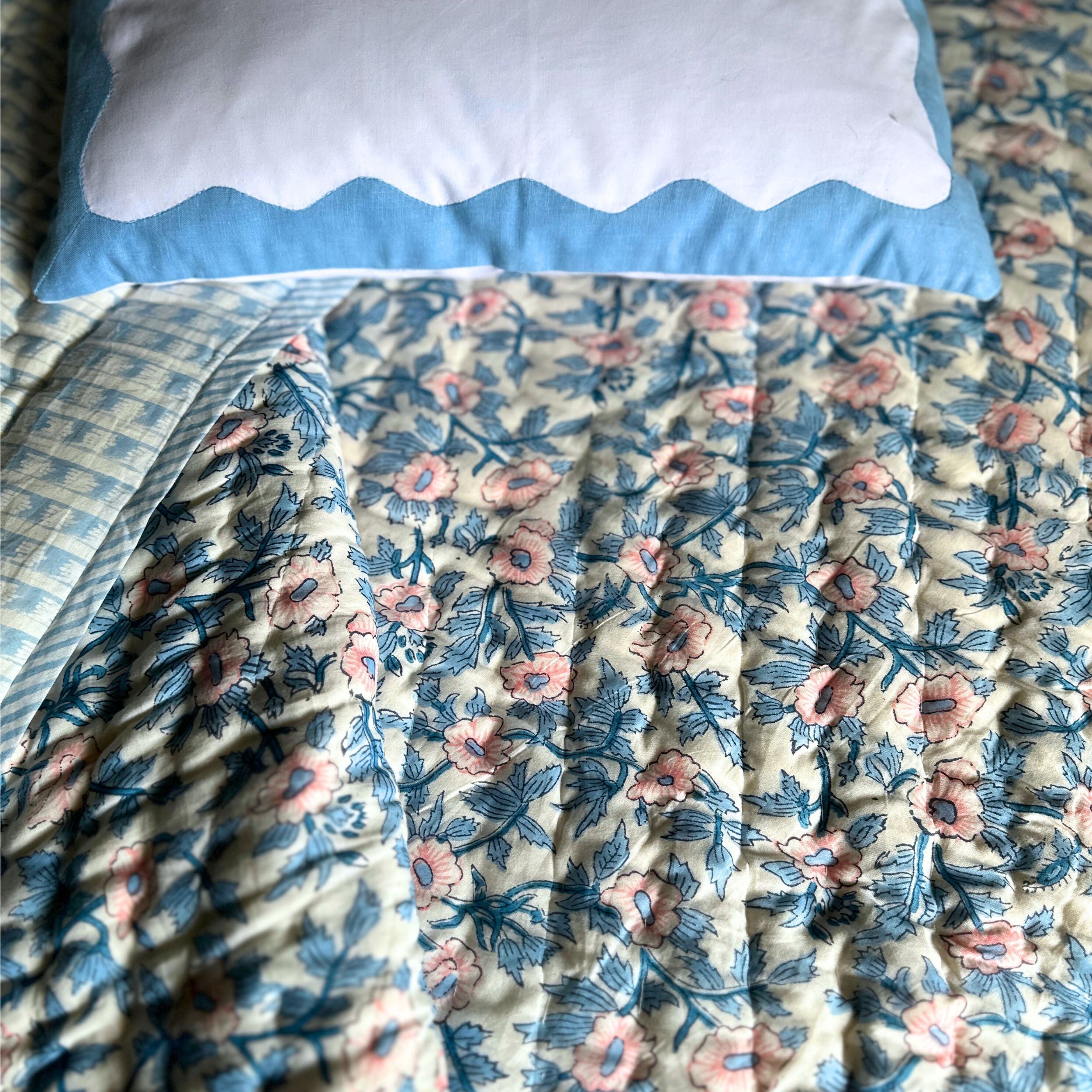Blue and Pink Floral Quilt