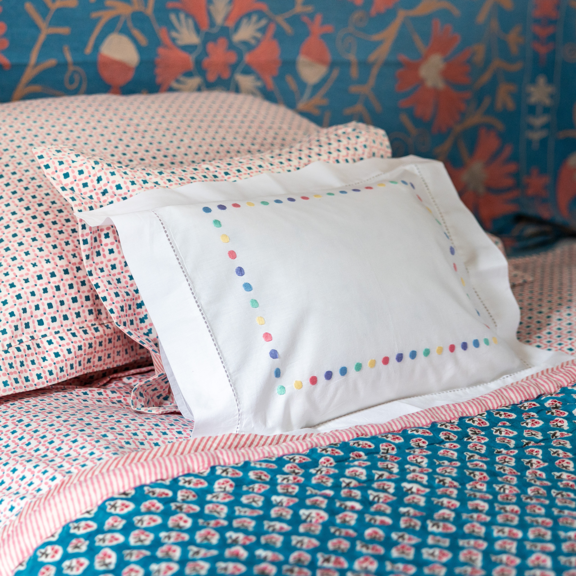 baby pillowcase with embroidered dots